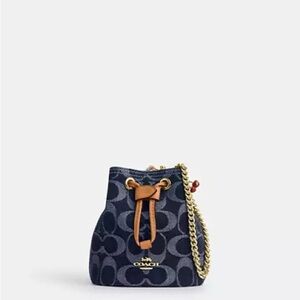 NWOTCoach Navy Signature Mini Drawstring Bucket Bag with Tan Trim and Gold Chain